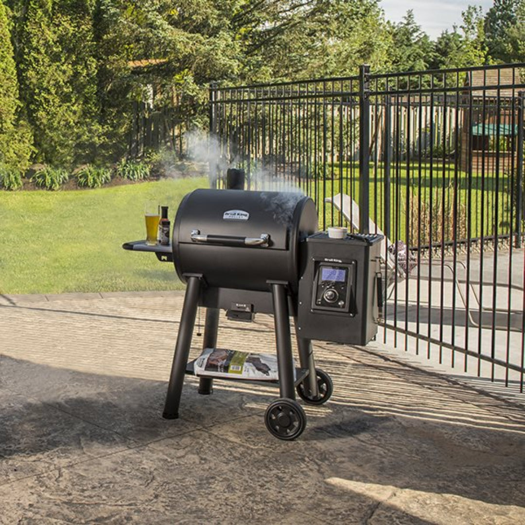 Pellet Grill, Broil King, Regal Pellet 400 Series, outdoor patio smoking with accessories on side shelf