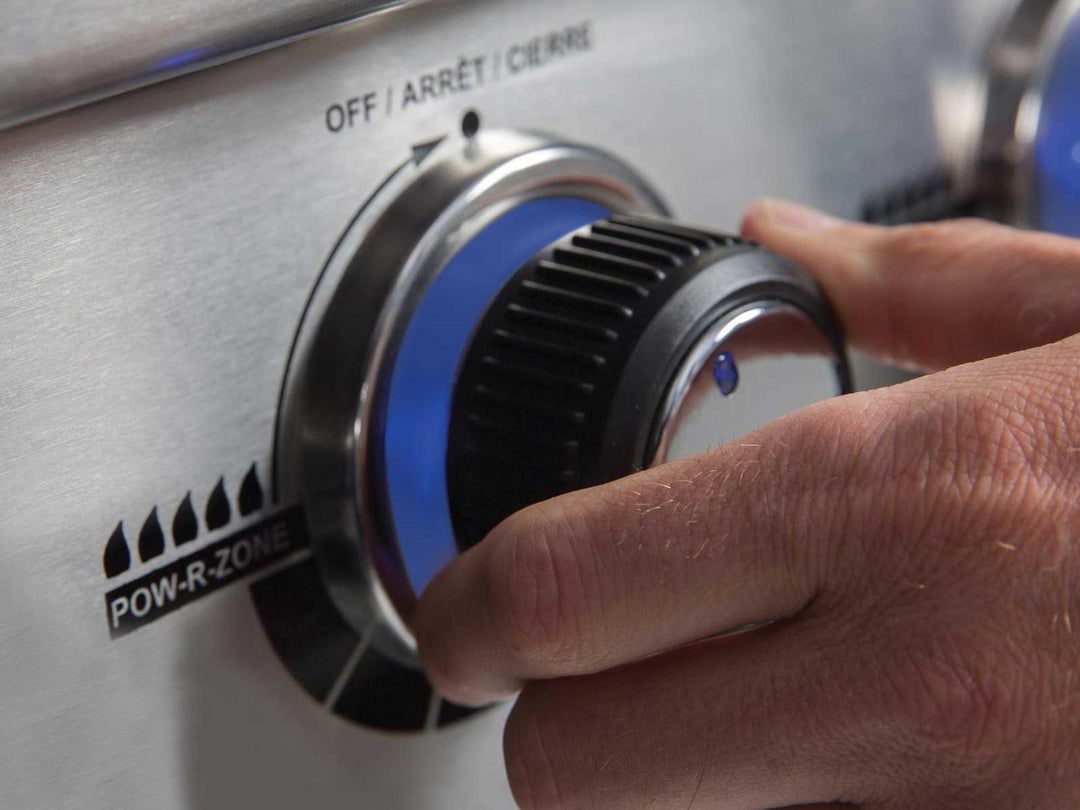 Control knob on Broil King Regal series grill with POW-R-ZONE feature and illuminated blue LED ring
