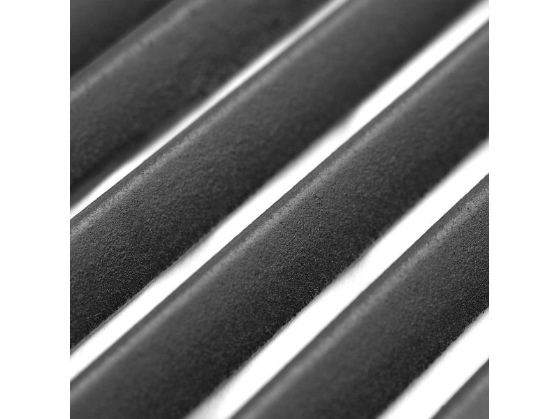 Close-up view of cast stainless steel cooking grate bars with matte finish and even spacing.