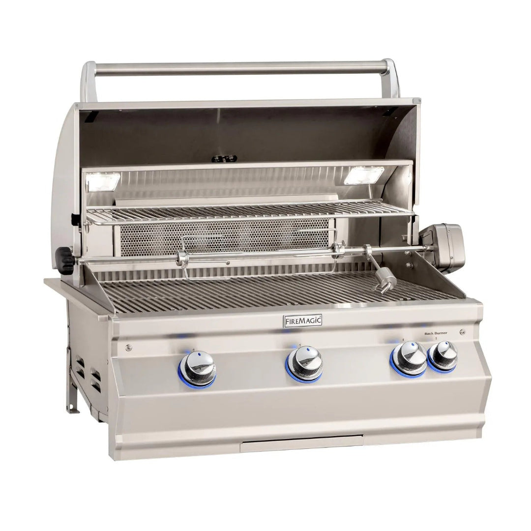 Fire Magic A660i stainless steel 4-burner built-in outdoor gas grill with rotisserie, warming rack and illuminated control knobs