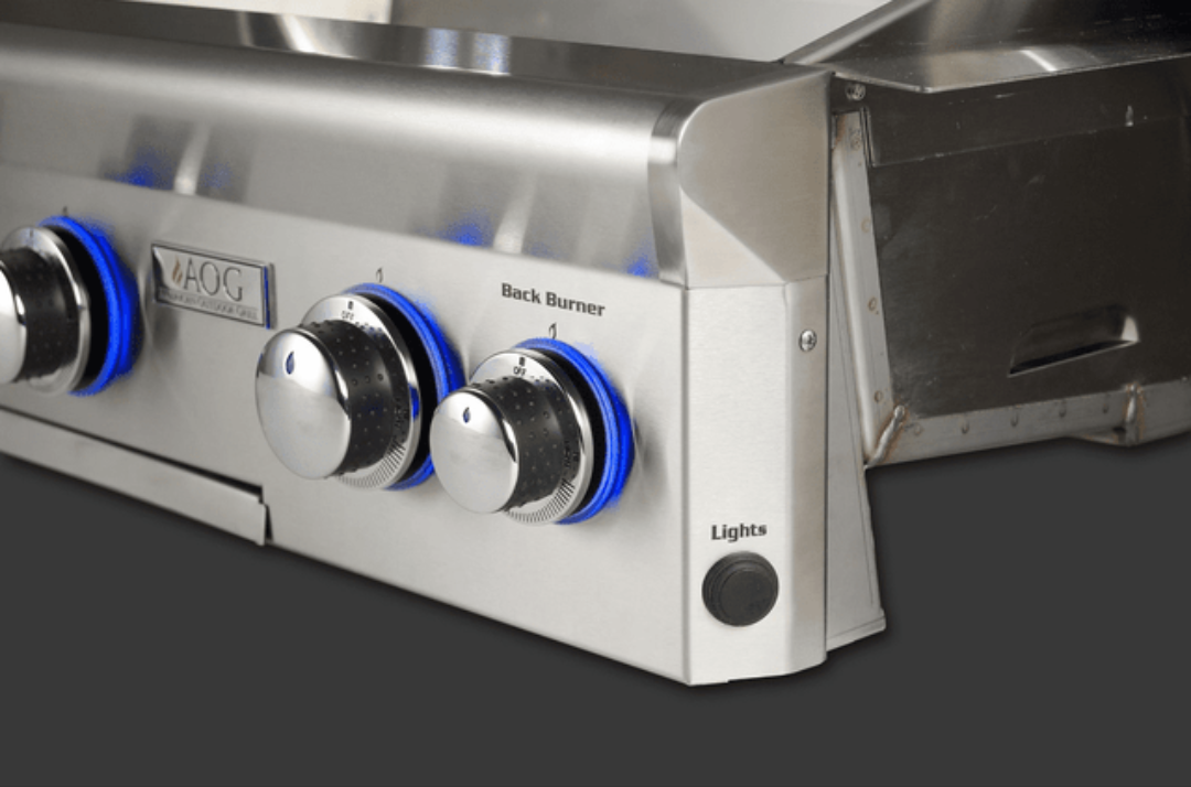 AOG 36-inch stainless steel natural gas grill control panel close-up with illuminated blue LED knobs, back burner label and lights button