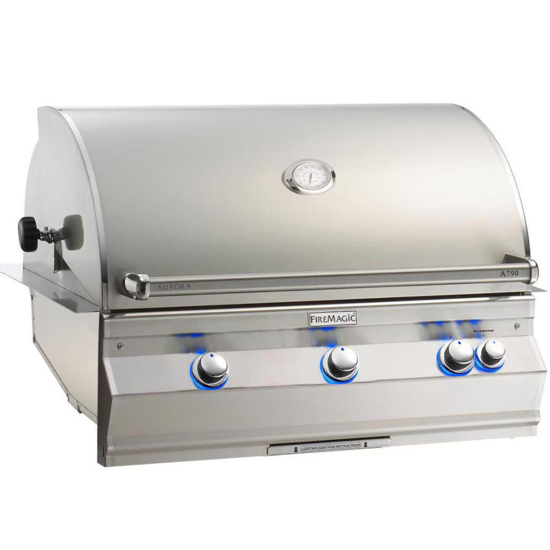 FireMagic Aurora Series A790i stainless steel built-in gas grill head with curved hood, analog thermometer, stainless handle and blue LED illuminated control knobs for outdoor kitchen replacement