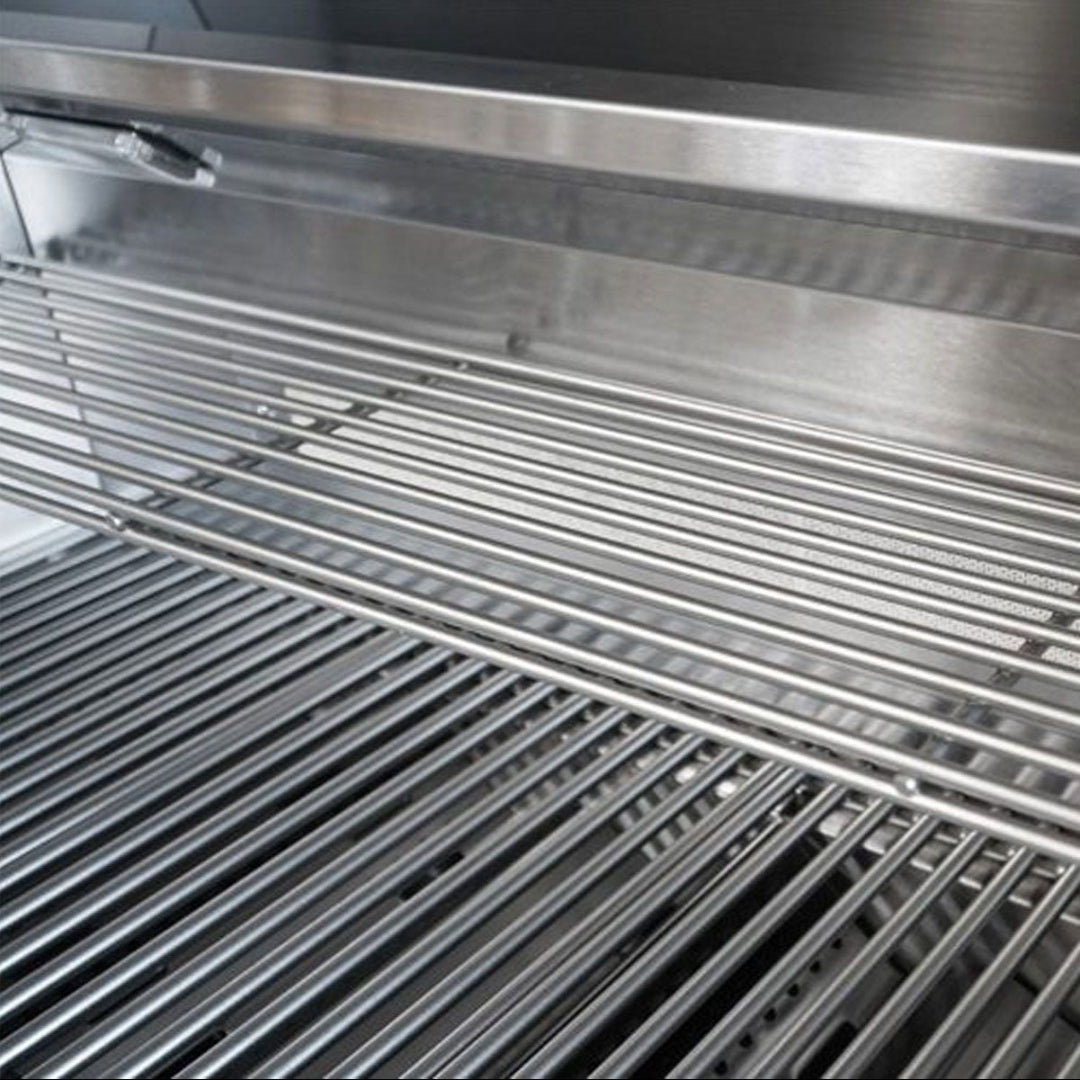 Broilmaster B-Series 32-inch 4-burner stainless steel propane gas grill BSB324NLN interior close-up of heavy-duty stainless rod cooking grates and upper warming rack