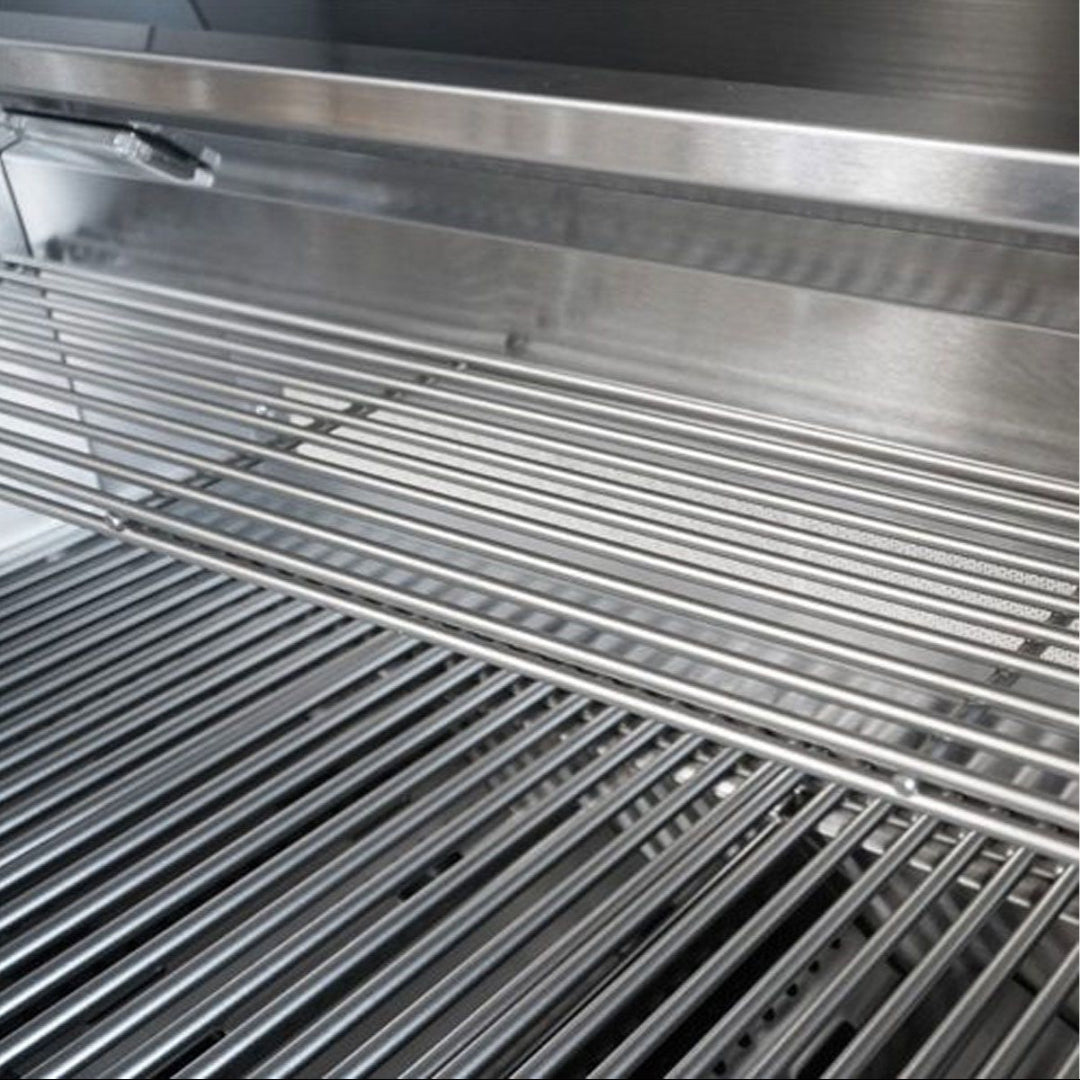 Broilmaster B-Series 32-inch 4-burner stainless steel propane grill head interior with stainless rod cooking grates and upper warming rack BSB324NLP