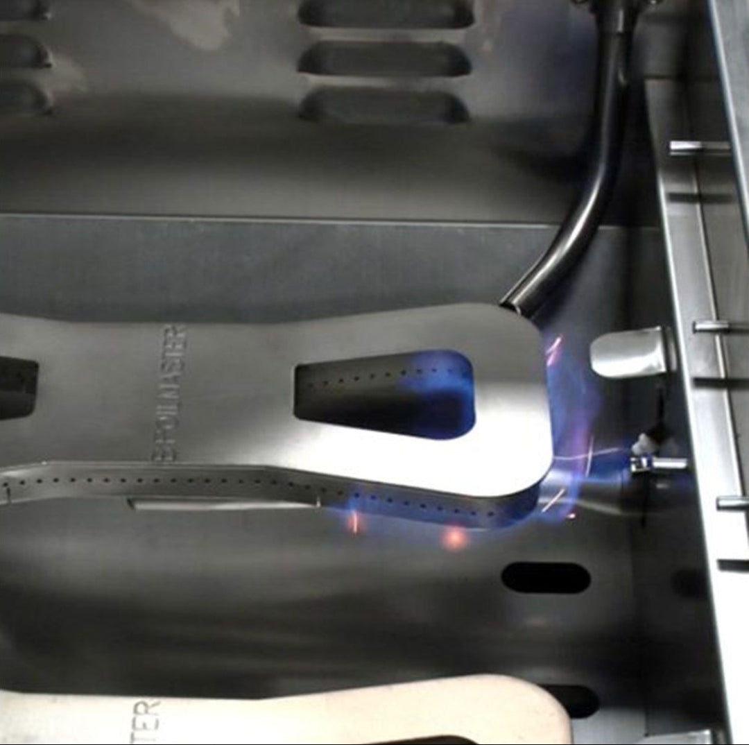 Broilmaster B-Series Basic Edition BSB253NLP 3-burner 25-inch propane gas grill interior close-up of stainless steel U-shaped primary burner with blue flame