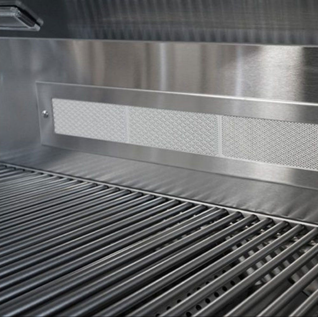 Broilmaster marine-grade 32-inch 4-burner propane grill interior with stainless steel rod cooking grates and perforated rear heat baffle diffuser BSB324MGP