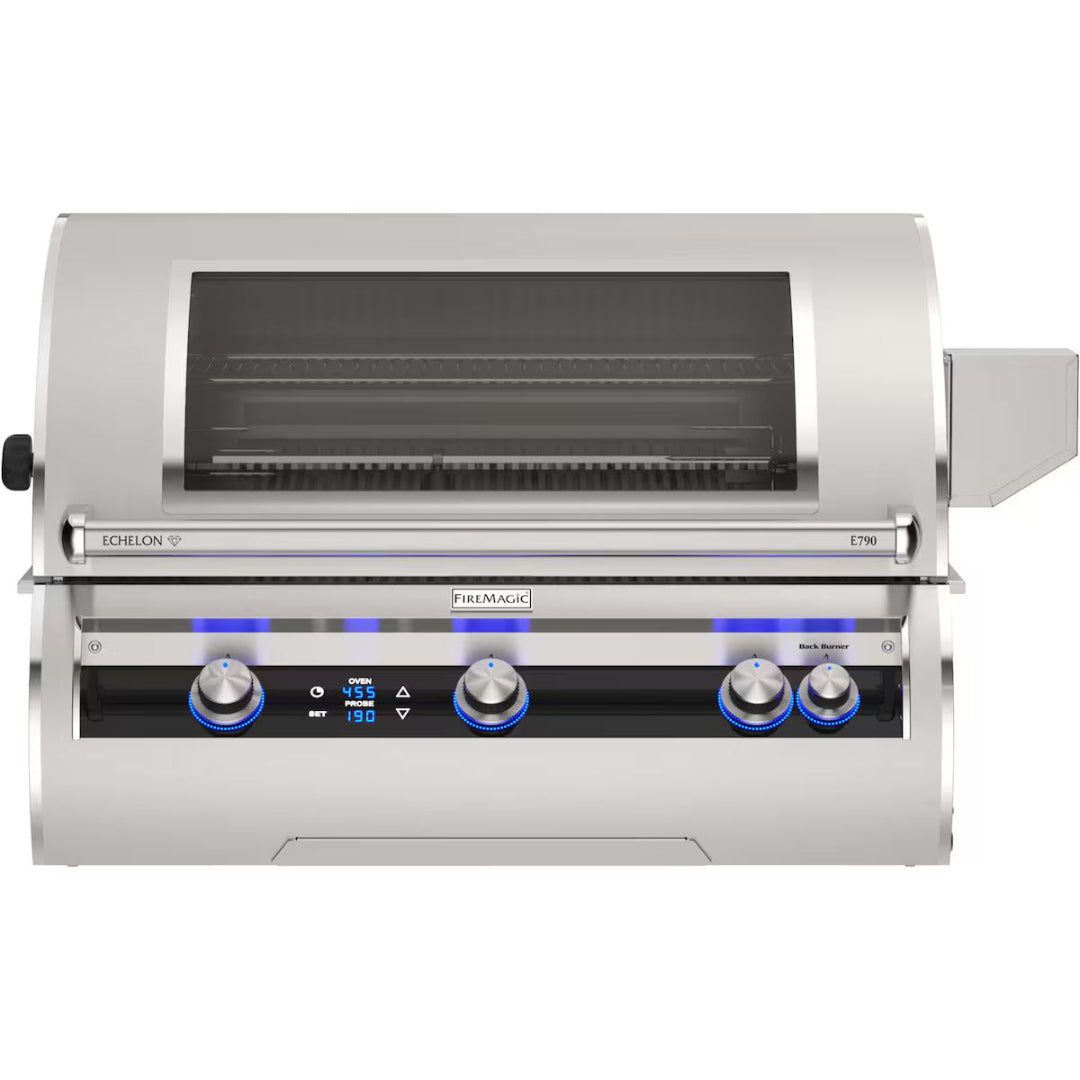 FireMagic Echelon E790i stainless steel built-in island gas grill with glass viewing window, digital oven/probe temperature display and blue LED illuminated control knobs