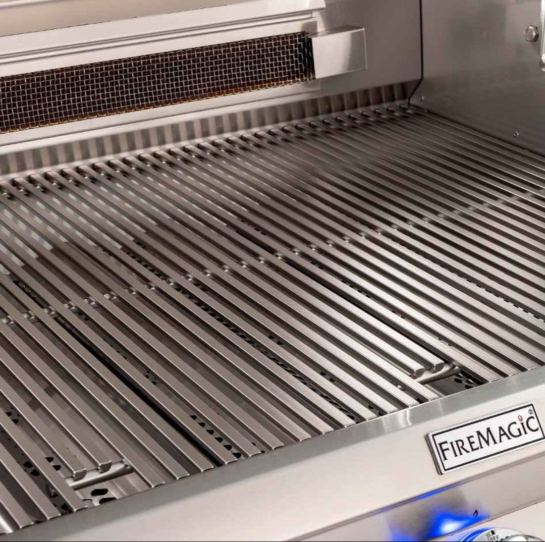 FireMagic E790i stainless steel replacement grill grates close-up, heavy-duty V-shaped cooking grates for built-in gas grills