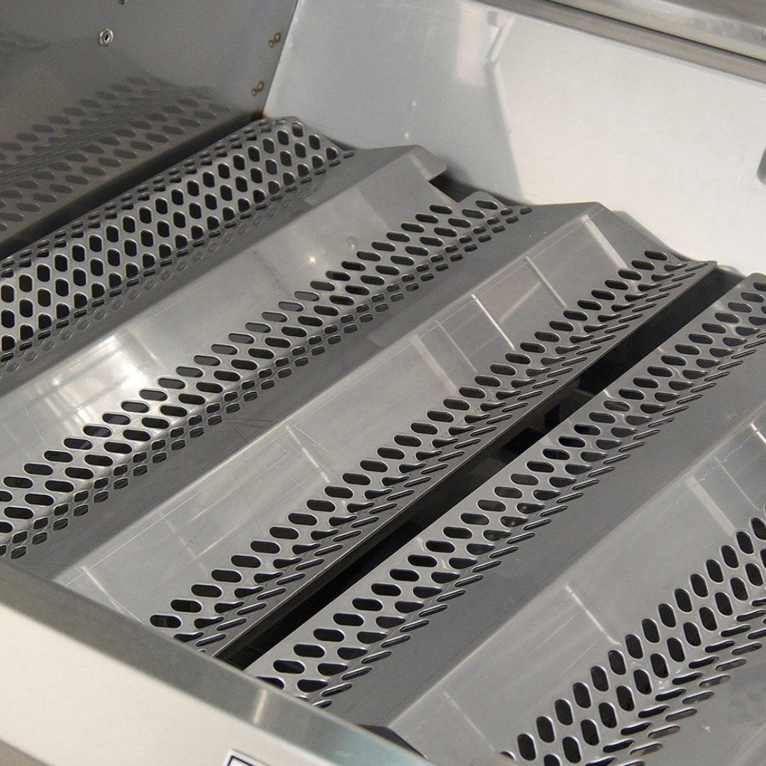 Close-up of Aurora stainless steel flavor grids replacement for gas grills — perforated flavorizer bars and heat deflectors