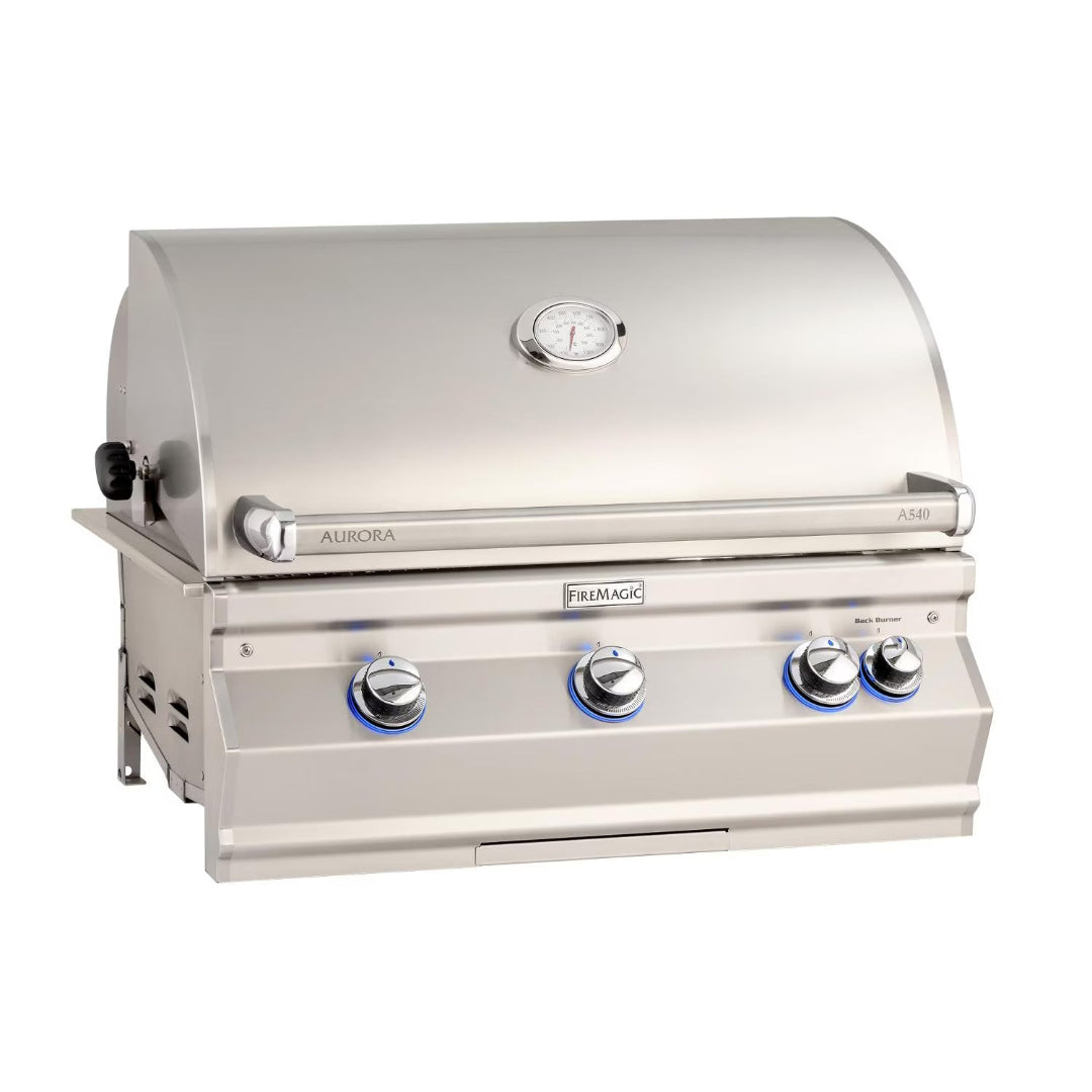 Fire Magic Aurora A540i built-in stainless steel gas grill head for outdoor kitchens with integrated lid thermometer, four blue-LED illuminated control knobs and rear burner
