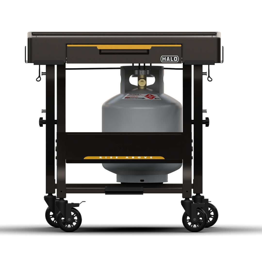 Front view of HALO Countertop Cart HO-1006-XNA, black powder-coated collapsible outdoor prep cart with drop-down drawer, mounted 20 lb propane tank and locking swivel casters