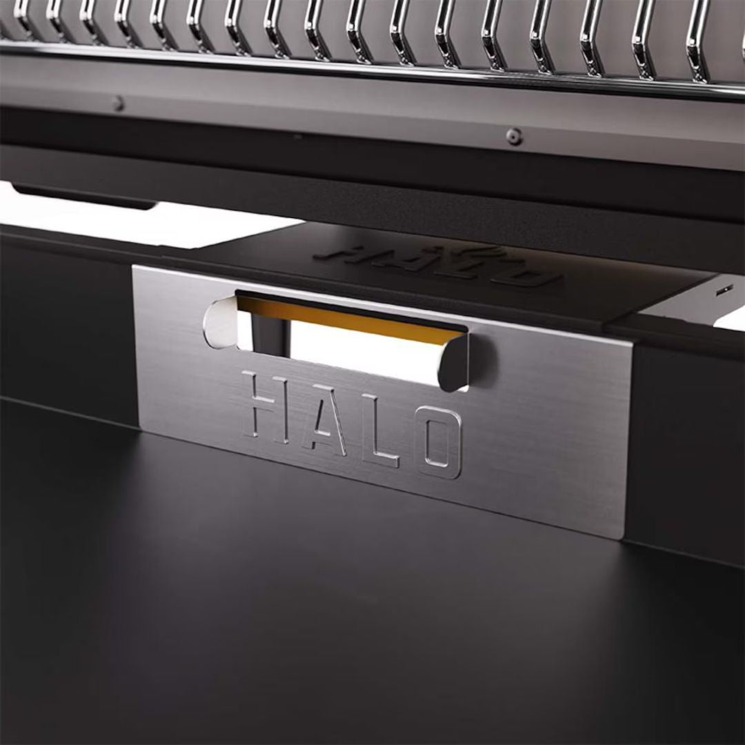 Stainless-steel HALO grease-trap gate (HZ-3013) with embossed HALO logo installed in an Elite griddle grease channel