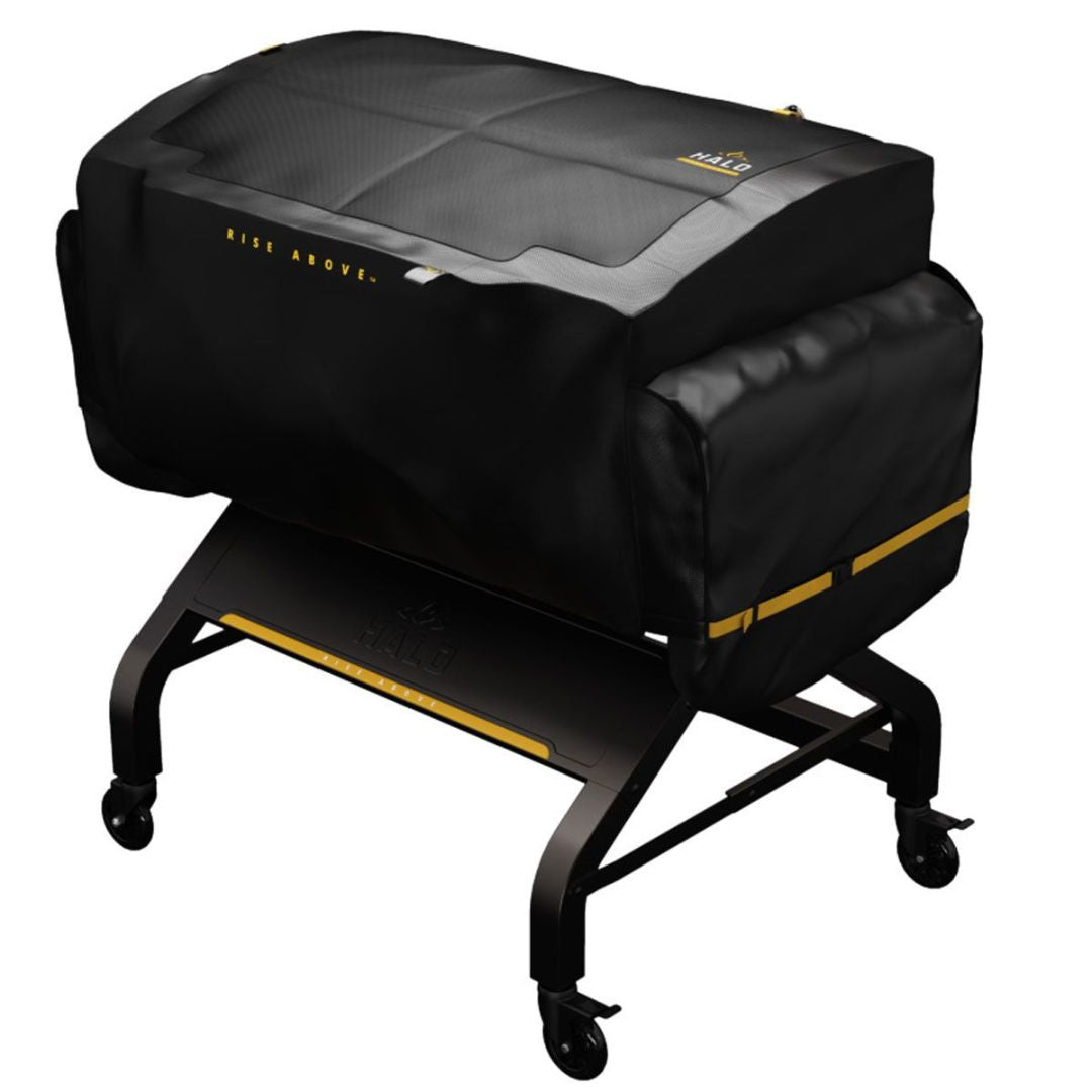HALO HZ-5001 black PVC-coated Elite 4B griddle cover with yellow HALO logo, fitted over griddle on wheeled stand