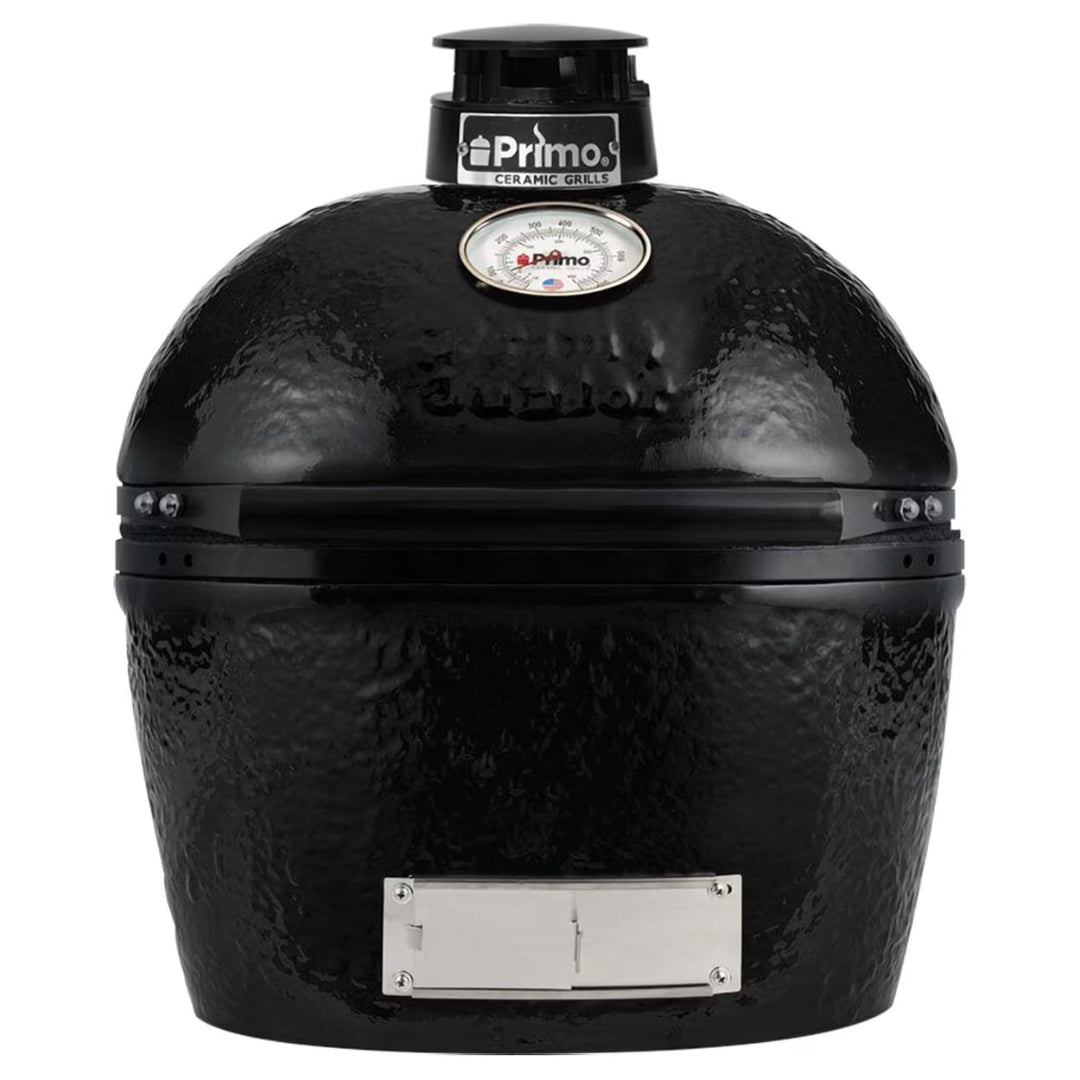 Primo JR black ceramic kamado grill — compact oval charcoal smoker with dome thermometer, adjustable top vent and stainless ash door for backyard grilling and smoking