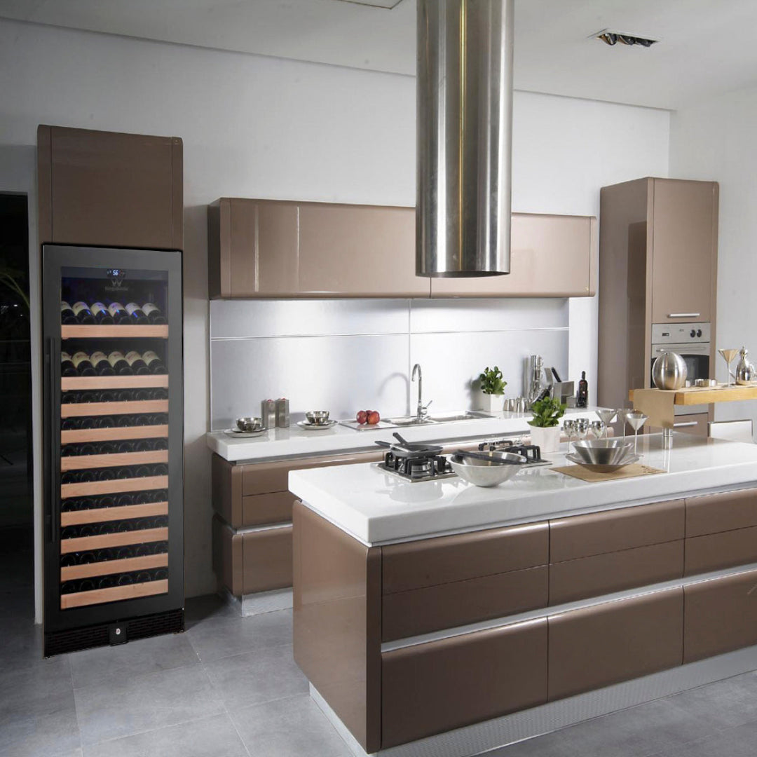 KBU100WX-FG 100-bottle built-in wine cooler with black glass door, wooden shelving, digital temperature display and LED interior lighting in modern kitchen