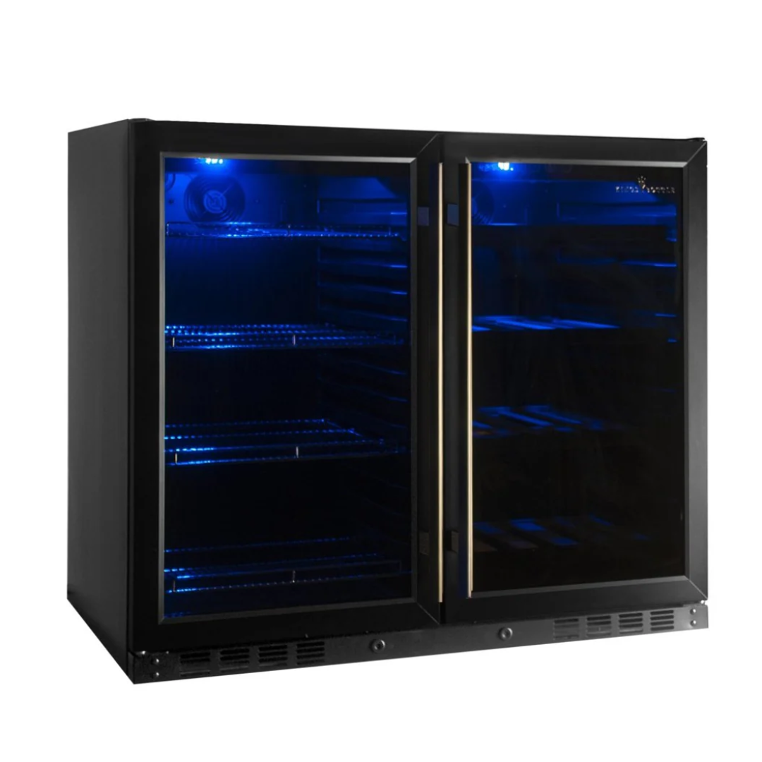 KBU28LRX undercounter dual-door wine and beverage cooler, black built-in glass-door refrigerator with blue LED interior lighting, adjustable wire shelves and gold-accent handles for home bar or kitchen