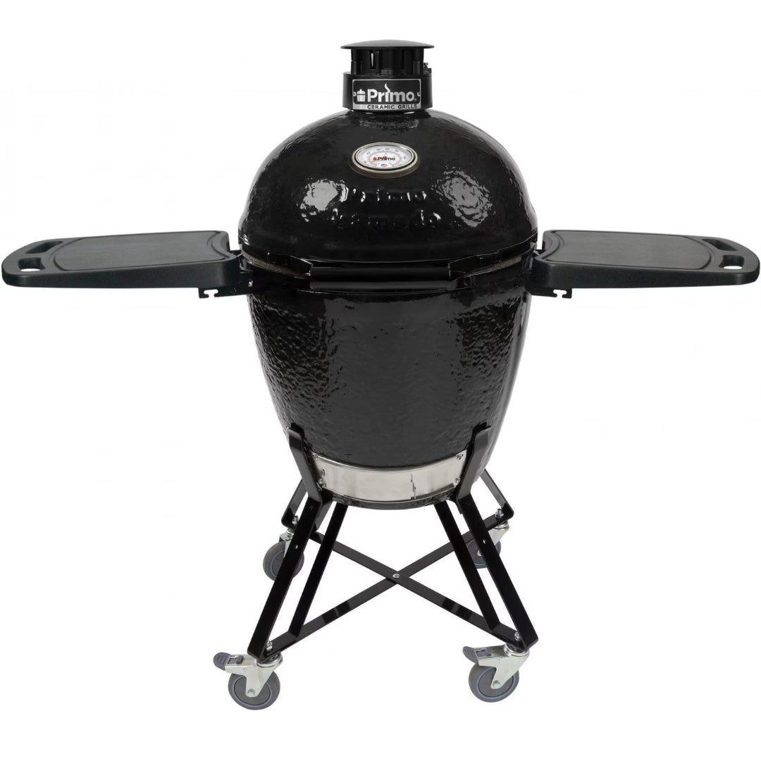 Primo black glazed ceramic kamado charcoal grill on wheeled cart with folding side shelves, top vent and built-in dome thermometer