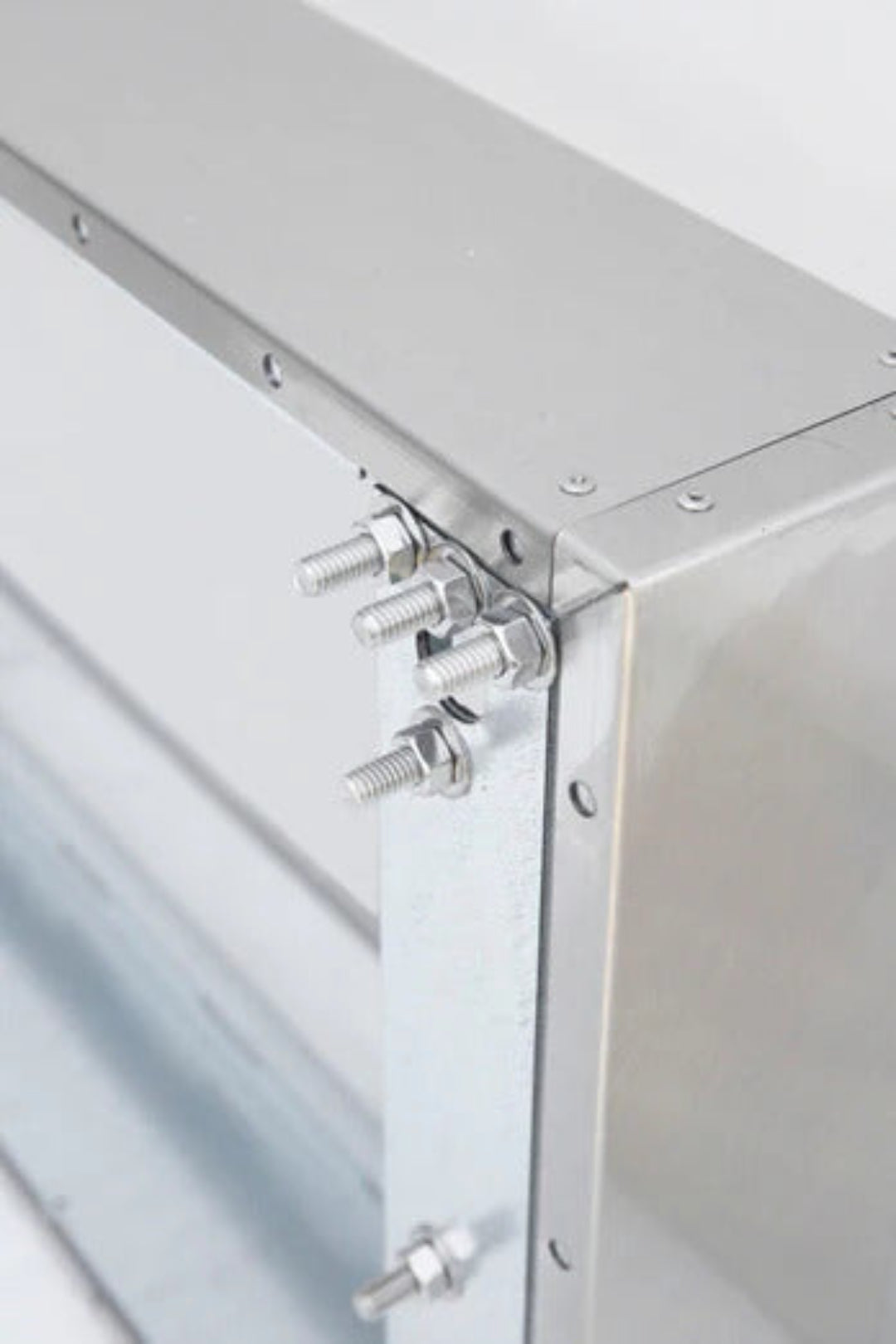 TF-VH48-2-SP4 48-inch stainless steel linear burner box corner with threaded mounting studs and hex nuts — replacement end cap for Vine & Flame ventless/outdoor linear gas fireplace burners