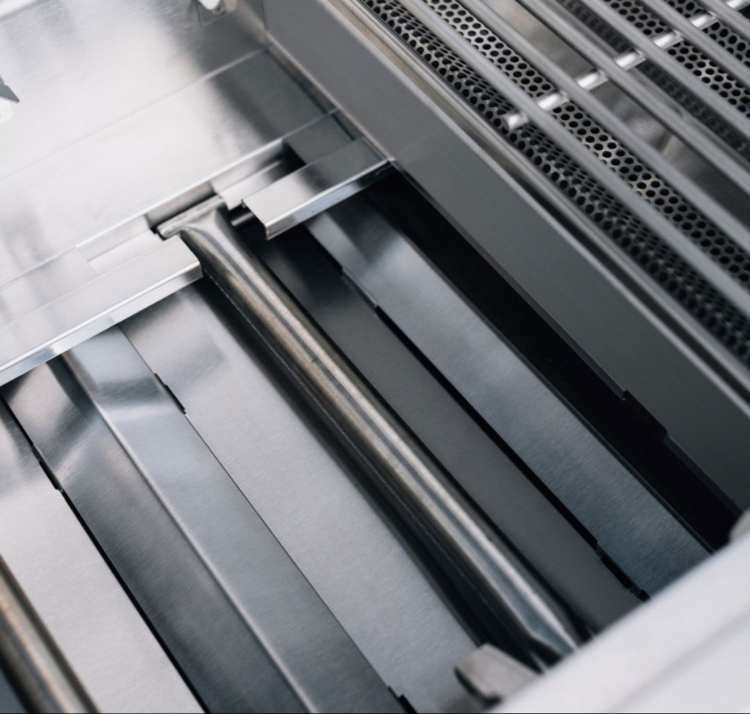 TrueFlame TFE Series 25 3-burner built-in natural gas grill interior close-up showing stainless steel tubular burners, stainless heat plates/flame tamers and perforated infrared burner TFE25-NG