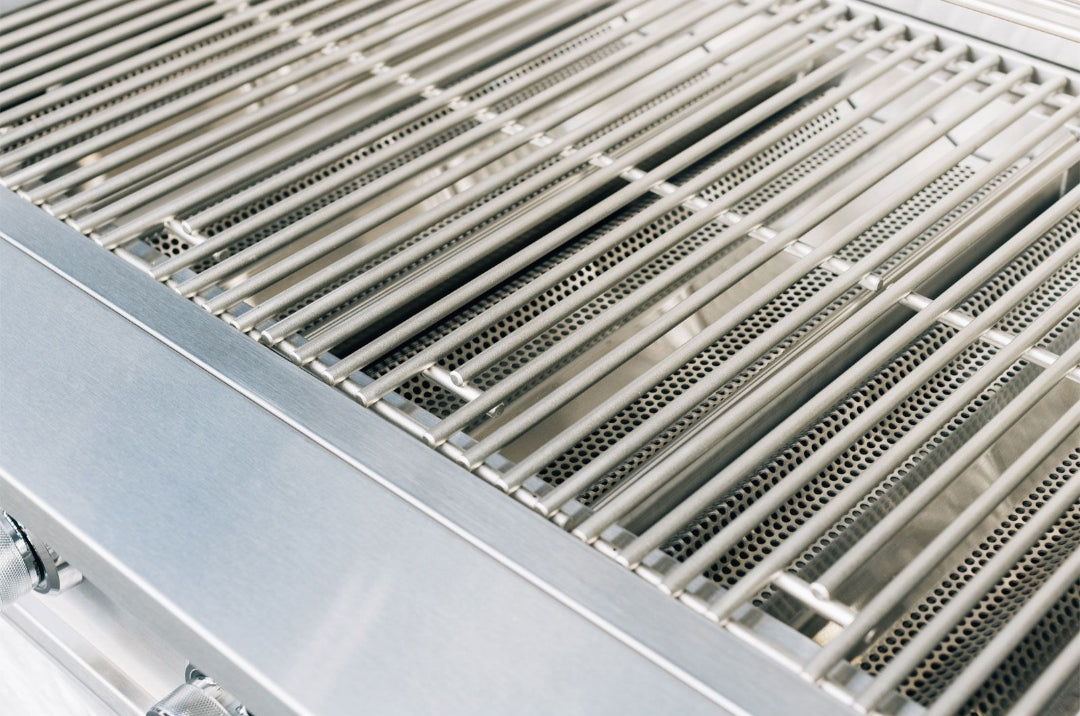 TrueFlame TFE32-NG 32-inch 4-burner built-in natural gas grill close-up stainless steel grates and perforated heat shields