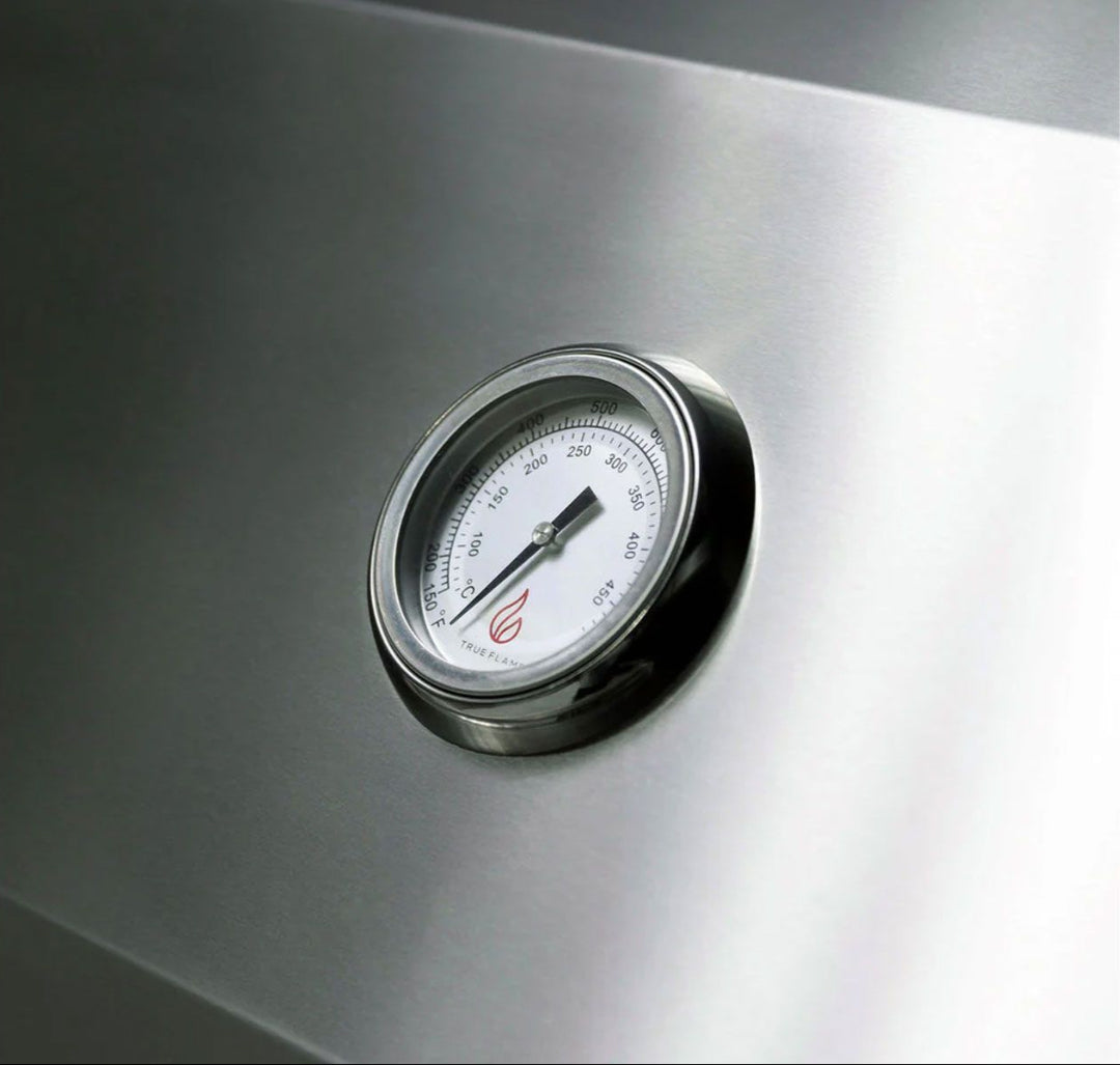Close-up stainless steel hood thermometer gauge on TrueFlame TF Series 25-inch 3-burner built-in natural gas grill TF25-NG8