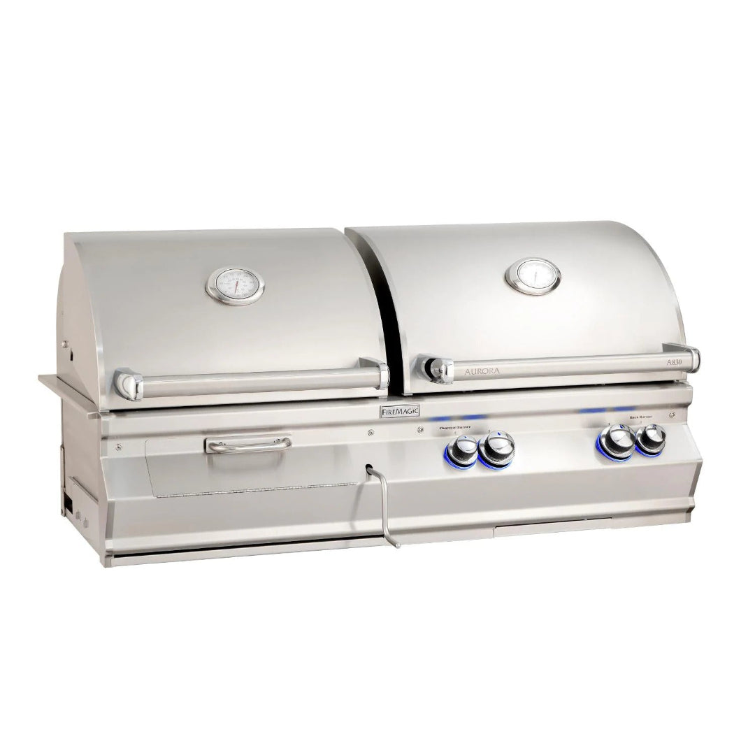 Fire Magic Aurora A830i built-in stainless steel dual-hood gas grill with integrated analog lid thermometers and illuminated control knobs for luxury outdoor kitchen islands