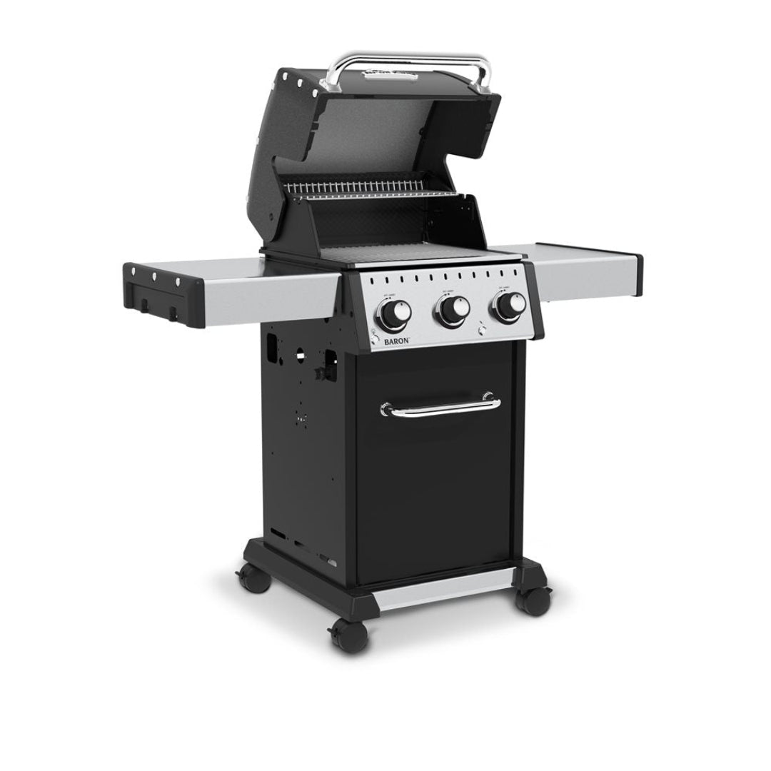 Freestanding grill, Broil King, Baron Series, 3-burner propane gas grill with lid open and warming rack visible