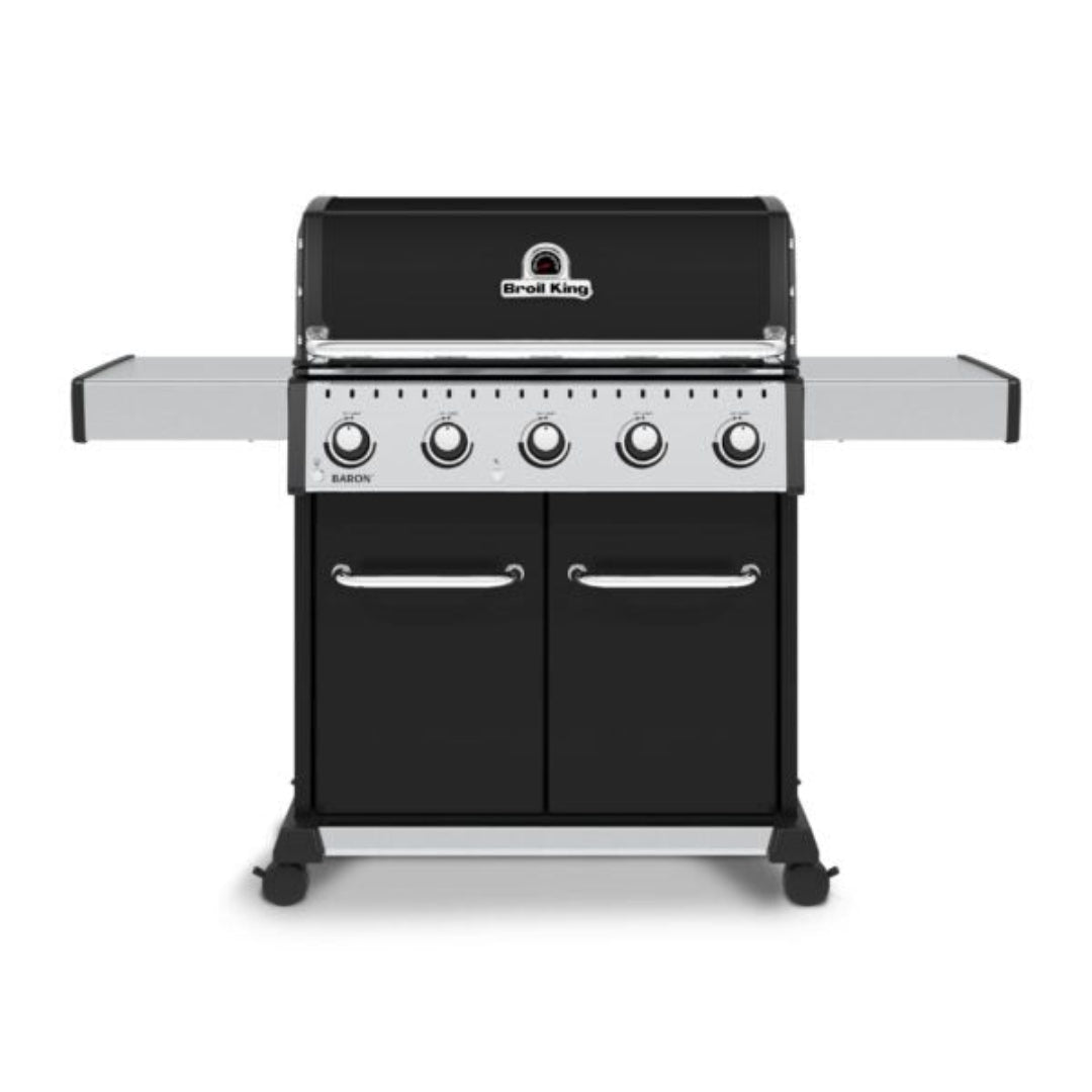 Freestanding grill, Broil King, Baron Series, 5-burner propane model with hood closed and stainless steel side shelves