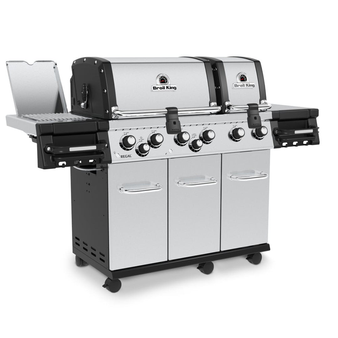 Broil King Regal S 690 Pro IR 6-burner stainless steel gas grill with infrared rear rotisserie, side burner and sear station, folding side shelves and three-door cabinet cart