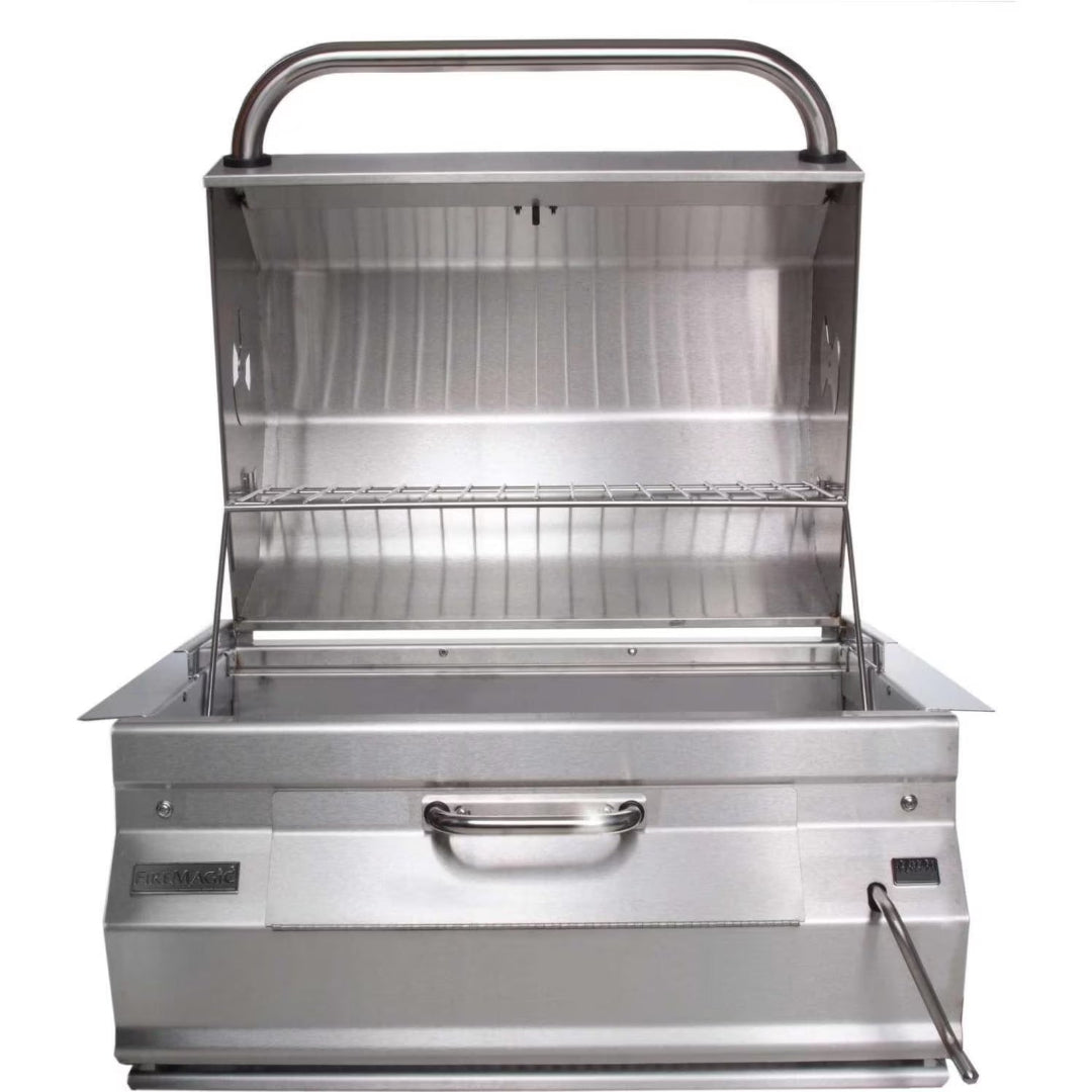 Fire Magic stainless steel built-in drop-in hooded outdoor grill with warming rack and front access handle for outdoor kitchen