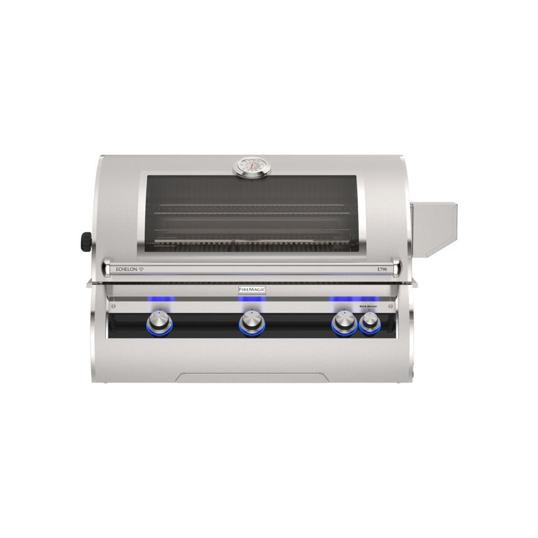 Fire Magic Echelon E790i built-in stainless steel gas grill with glass viewing window, analog hood thermometer and blue LED-illuminated control knobs
