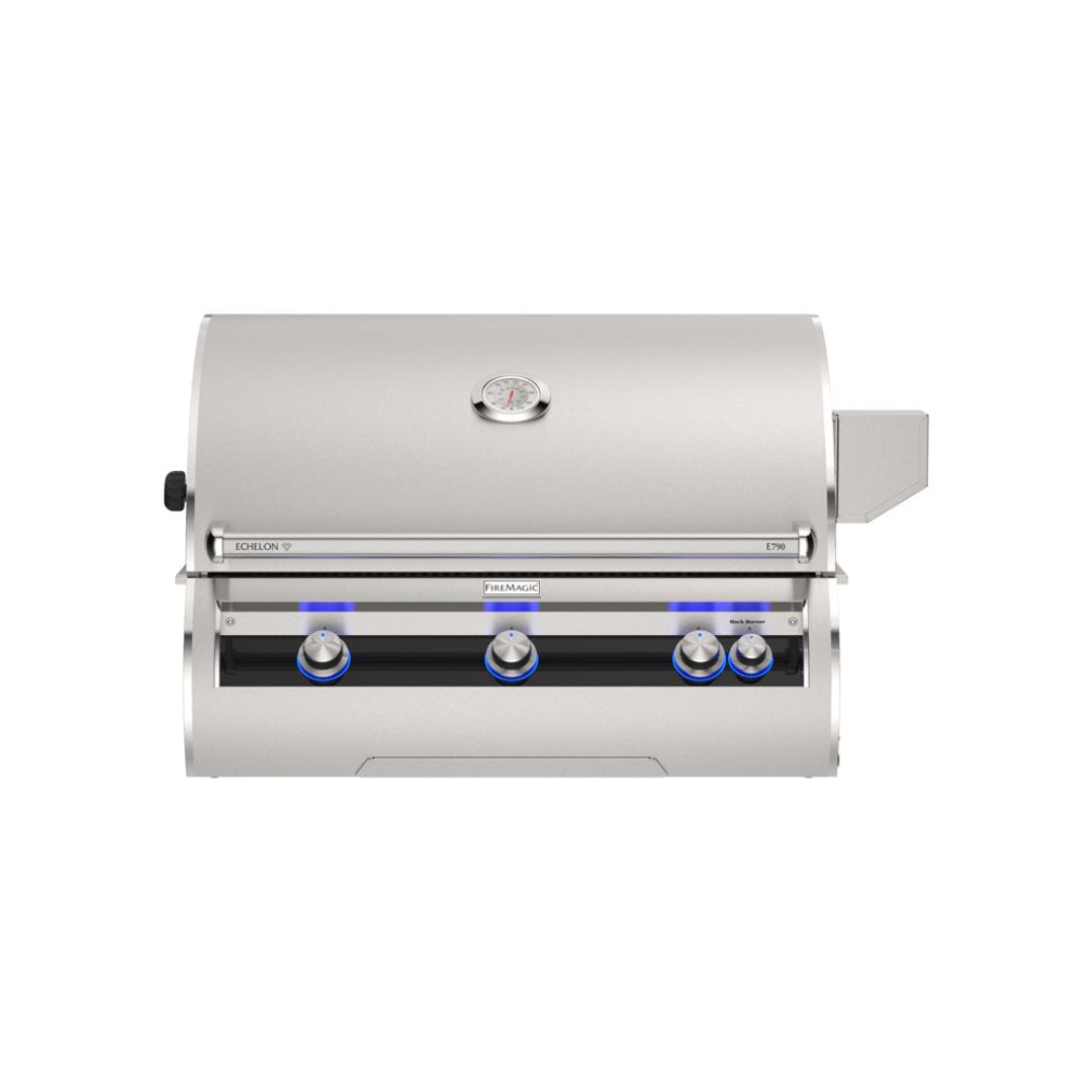 Fire Magic Echelon E790i built-in stainless steel gas grill for outdoor kitchen front view with analog lid thermometer and blue LED illuminated control knobs