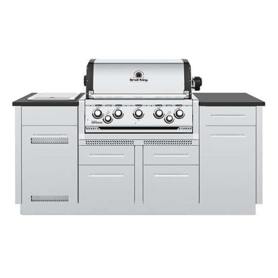 Broil King Imperial S 590i built-in stainless steel outdoor kitchen island gas grill with integrated side burner, storage drawers and black countertop